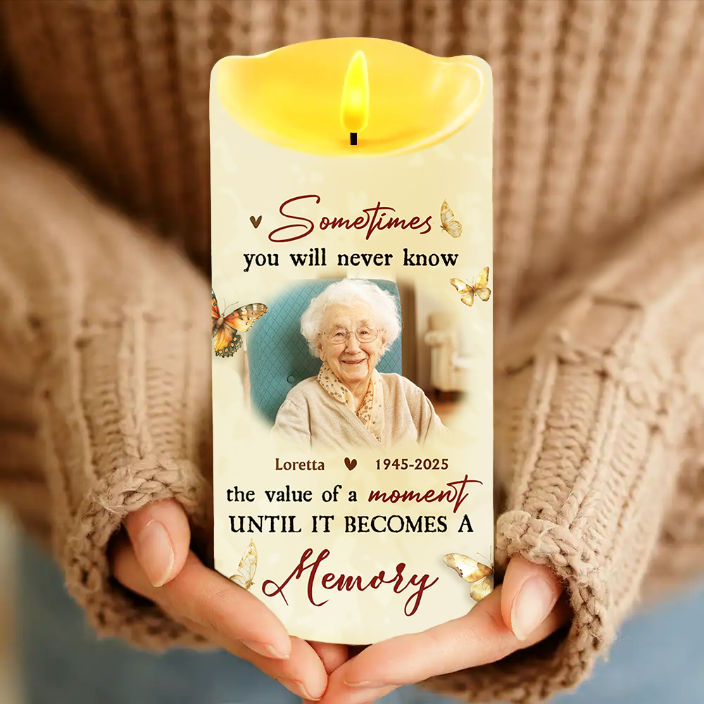 Personalized Photo LED Candle flickering with a custom image, creating a warm memorial keepsake.