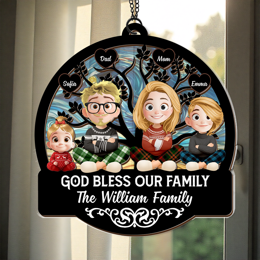 God Bless Our Family personalized Christmas suncatcher ornament hanging in a window.