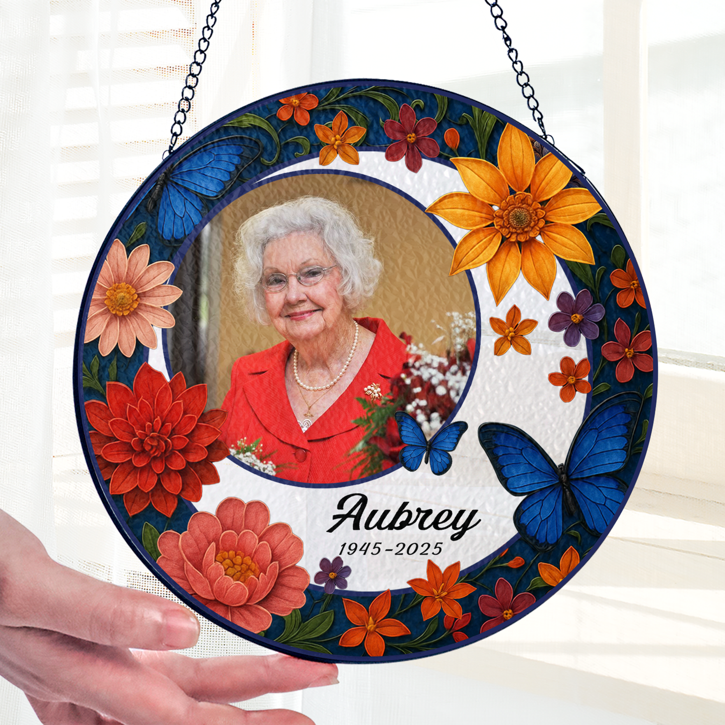 Personalized photo stained glass suncatcher hanging in a window, a unique & loving gift.