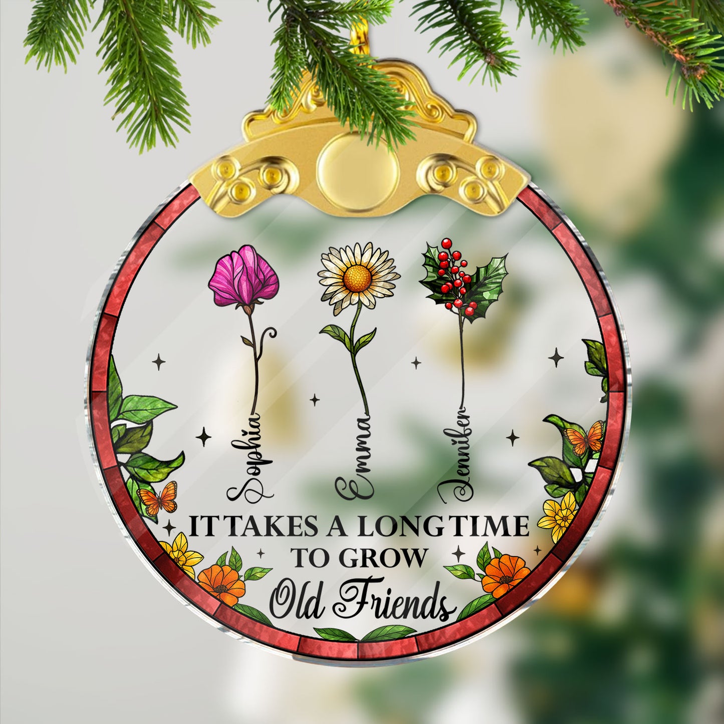 Personalized "It Takes a Long Time to Grow Old Friends" glass ornament with silver and gold cap.