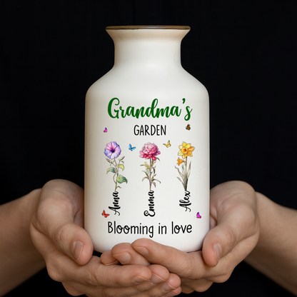 Elegant white ceramic flower vase with "Grandma's Garden is Grown with Seeds of Love" design.