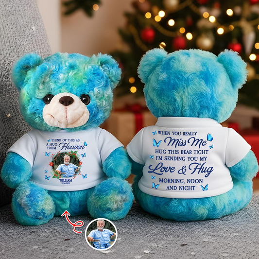 A Christmas Hug From Heaven personalized memorial teddy bear with glitter wings.