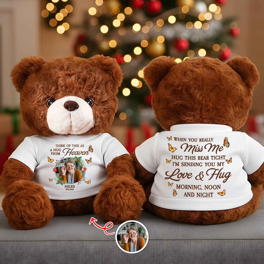 A Christmas Hug From Heaven personalized memorial teddy bear with glitter wings.