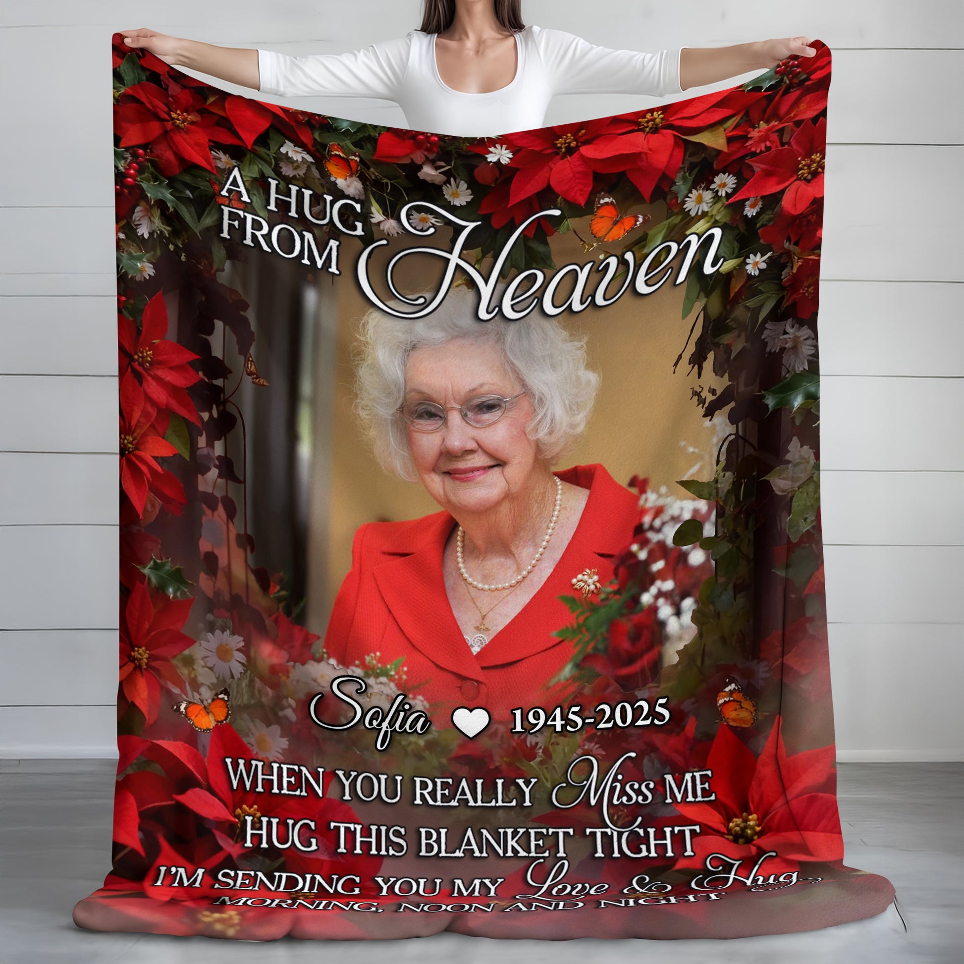 A Hug From Heaven memorial blanket with a wreath and personalized text.