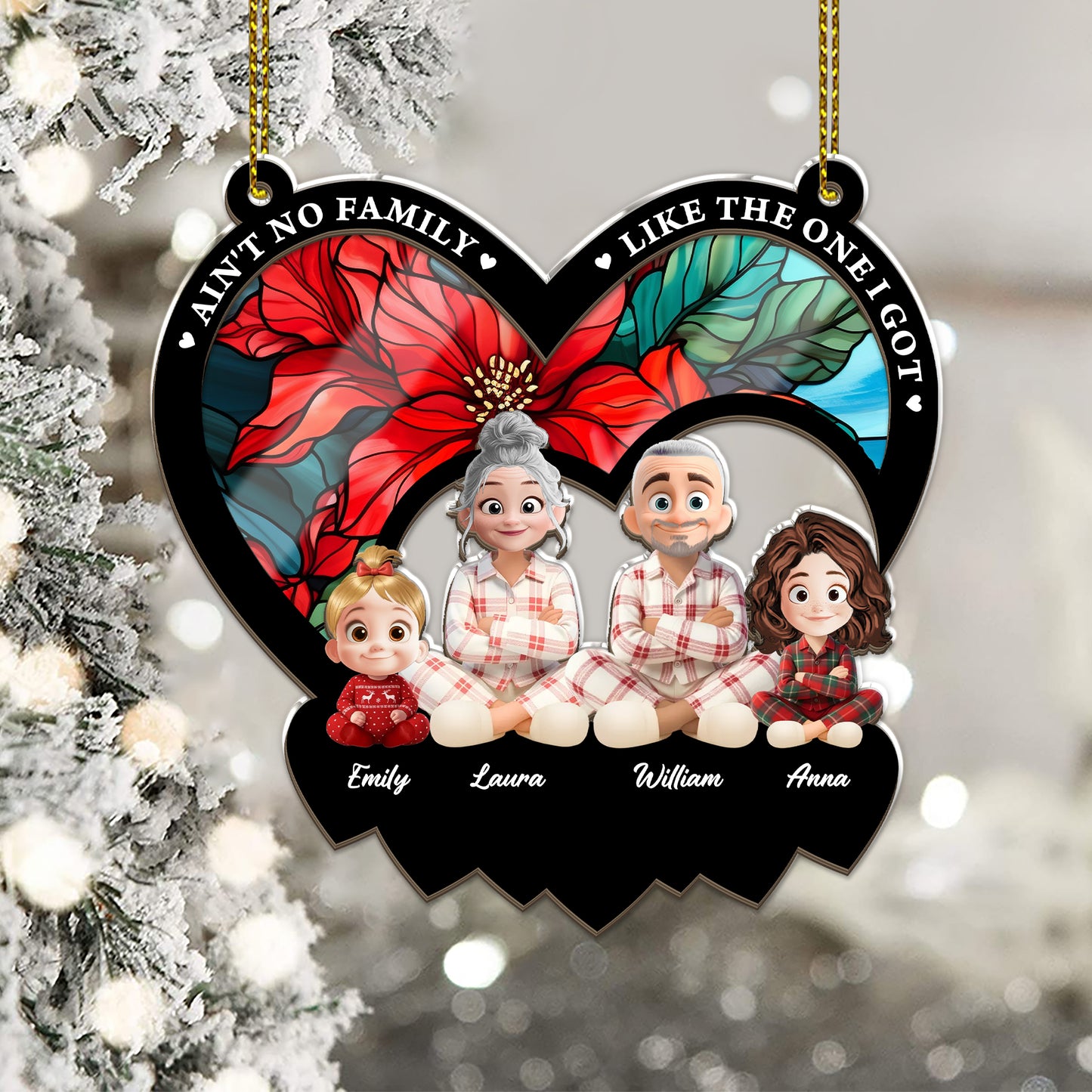 Personalized "Ain't No Family Like The One I Got" suncatcher ornament hanging in a window.