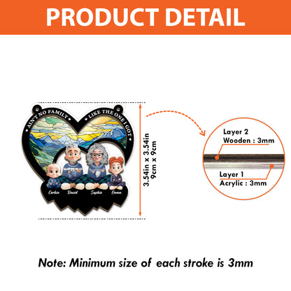 Personalized "Ain't No Family Like The One I Got" suncatcher ornament hanging in a window.