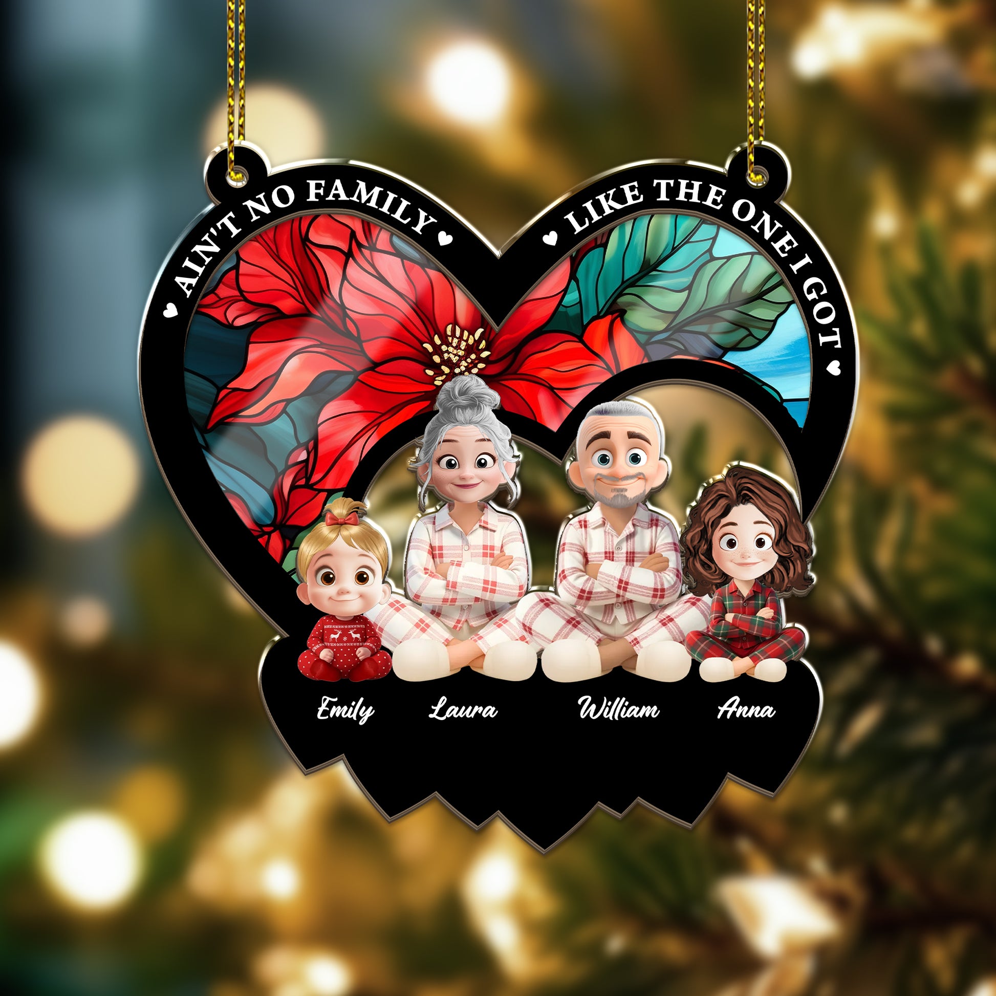 Personalized "Ain't No Family Like The One I Got" suncatcher ornament hanging in a window.