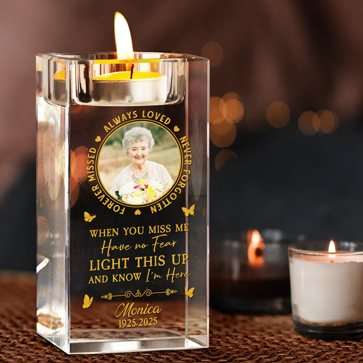 Personalized crystal candle holder with "Always Loved, Never Forgotten" engraving.