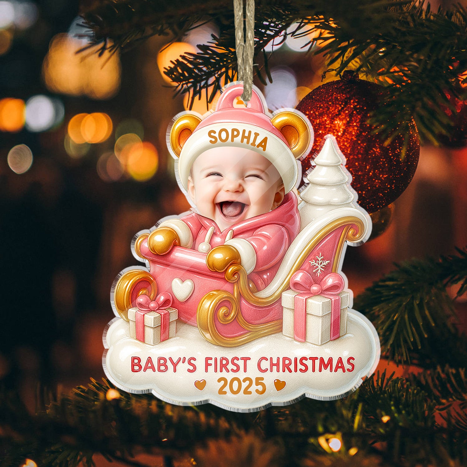 Baby's First Christmas personalized acrylic ornament with custom name and festive holiday design.