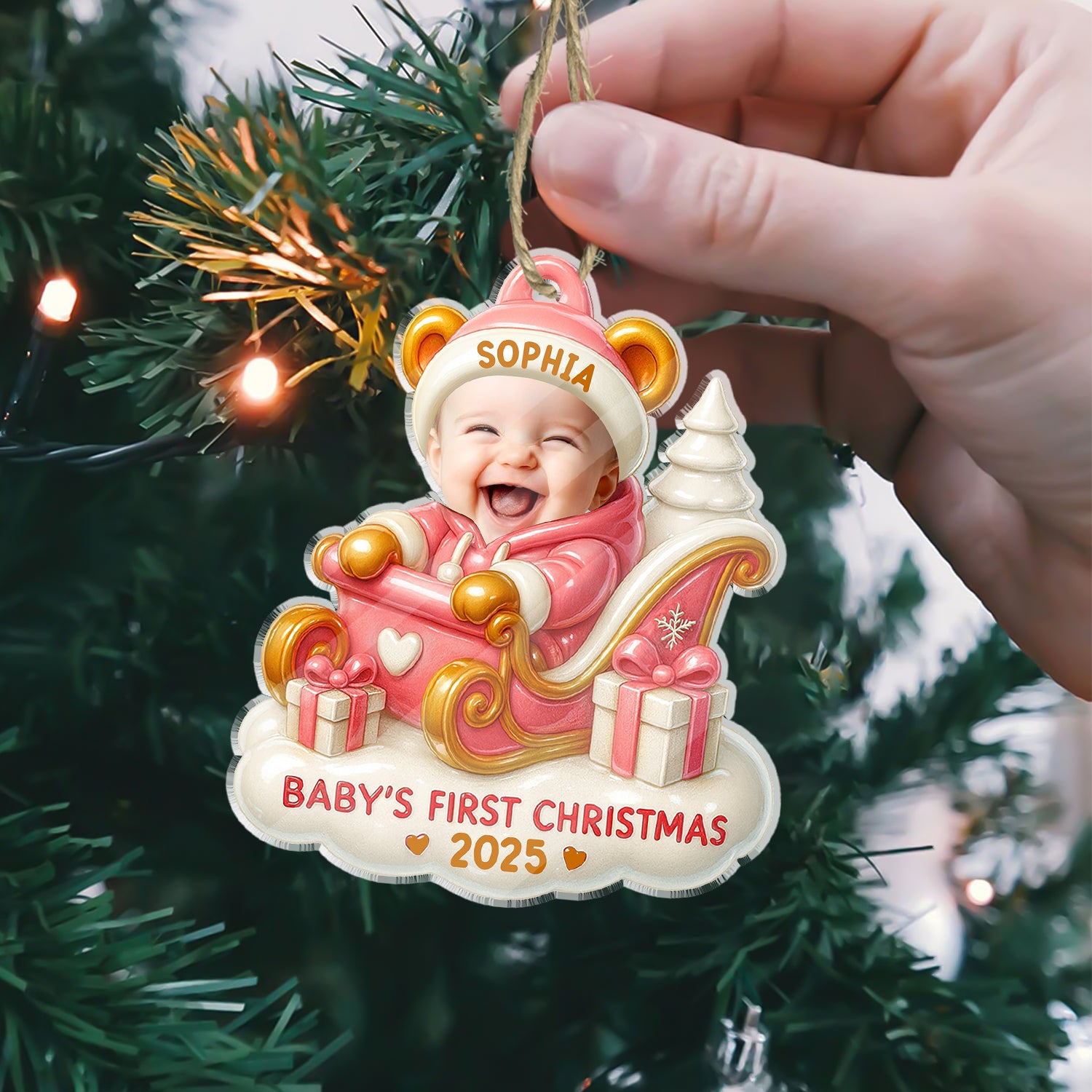 Baby's First Christmas personalized acrylic ornament with custom name and festive holiday design.