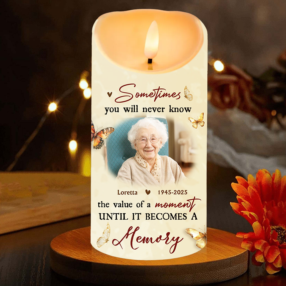 Personalized Photo LED Candle flickering with a custom image, creating a warm memorial keepsake.
