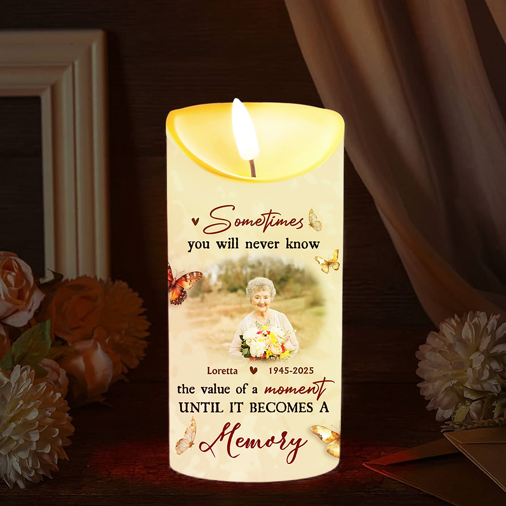 Personalized Photo LED Candle flickering with a custom image, creating a warm memorial keepsake.