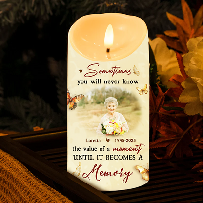 Personalized Photo LED Candle flickering with a custom image, creating a warm memorial keepsake.