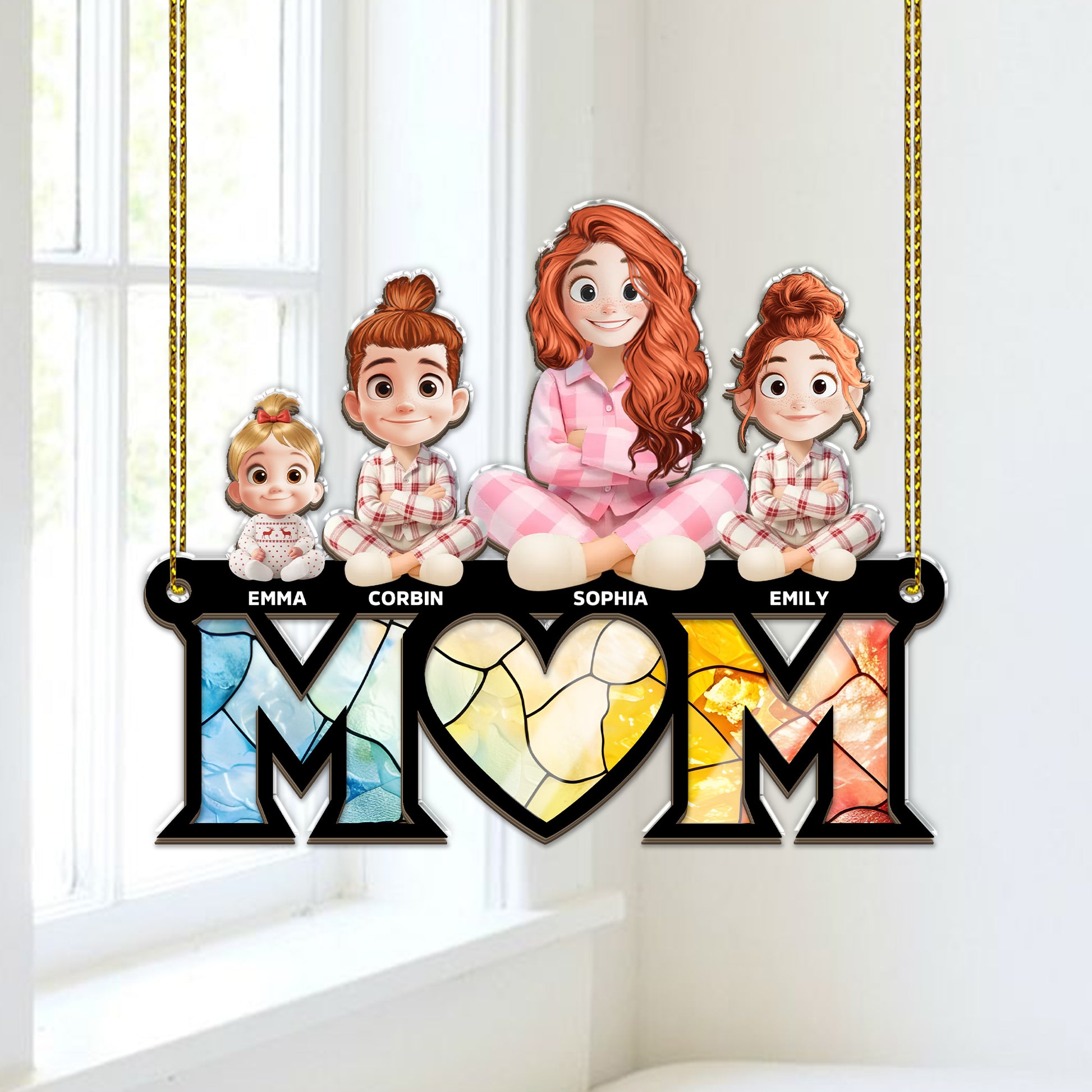 Best Mom Ever personalized suncatcher ornament hanging in a window.