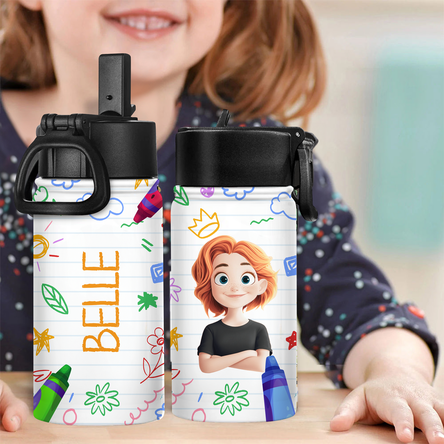 Personalized kids water bottle with straw lid and custom drawing.