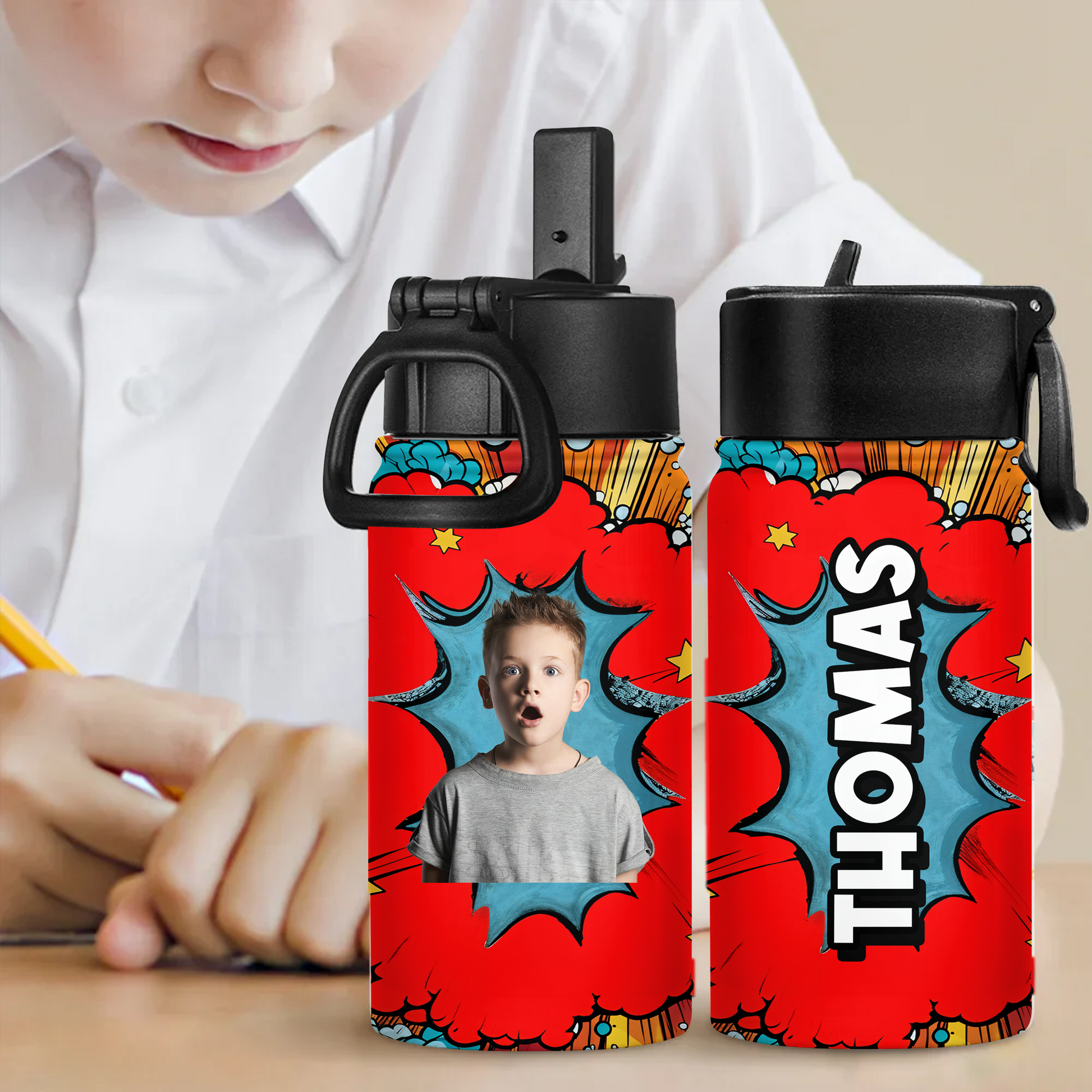 Comic Book Back to School Water Bottle: 12 oz stainless steel bottle with straw lid, colorful superhero design.
