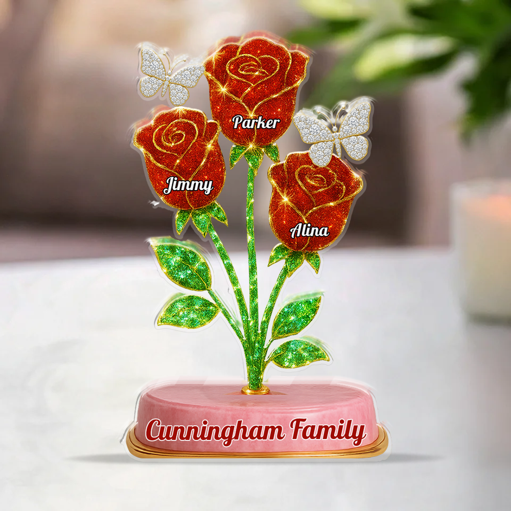 Custom family acrylic block plaque with red roses and personalized figures.
