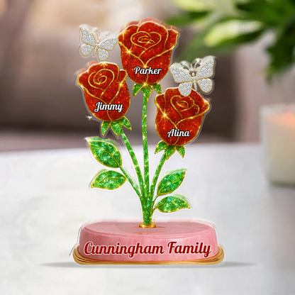 Custom family acrylic block plaque with red roses and personalized figures.