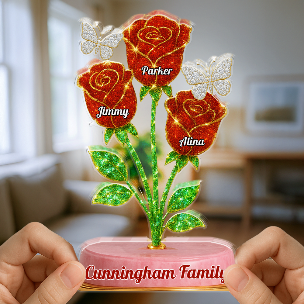 Custom family acrylic block plaque with red roses and personalized figures.