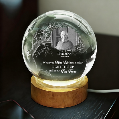 Personalized crystal globe lamp with custom photo, a unique memorial keepsake.