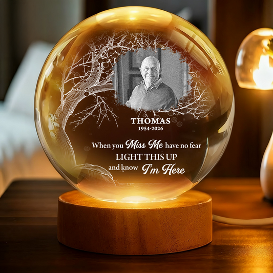 Personalized crystal globe lamp with custom photo, a unique memorial keepsake.