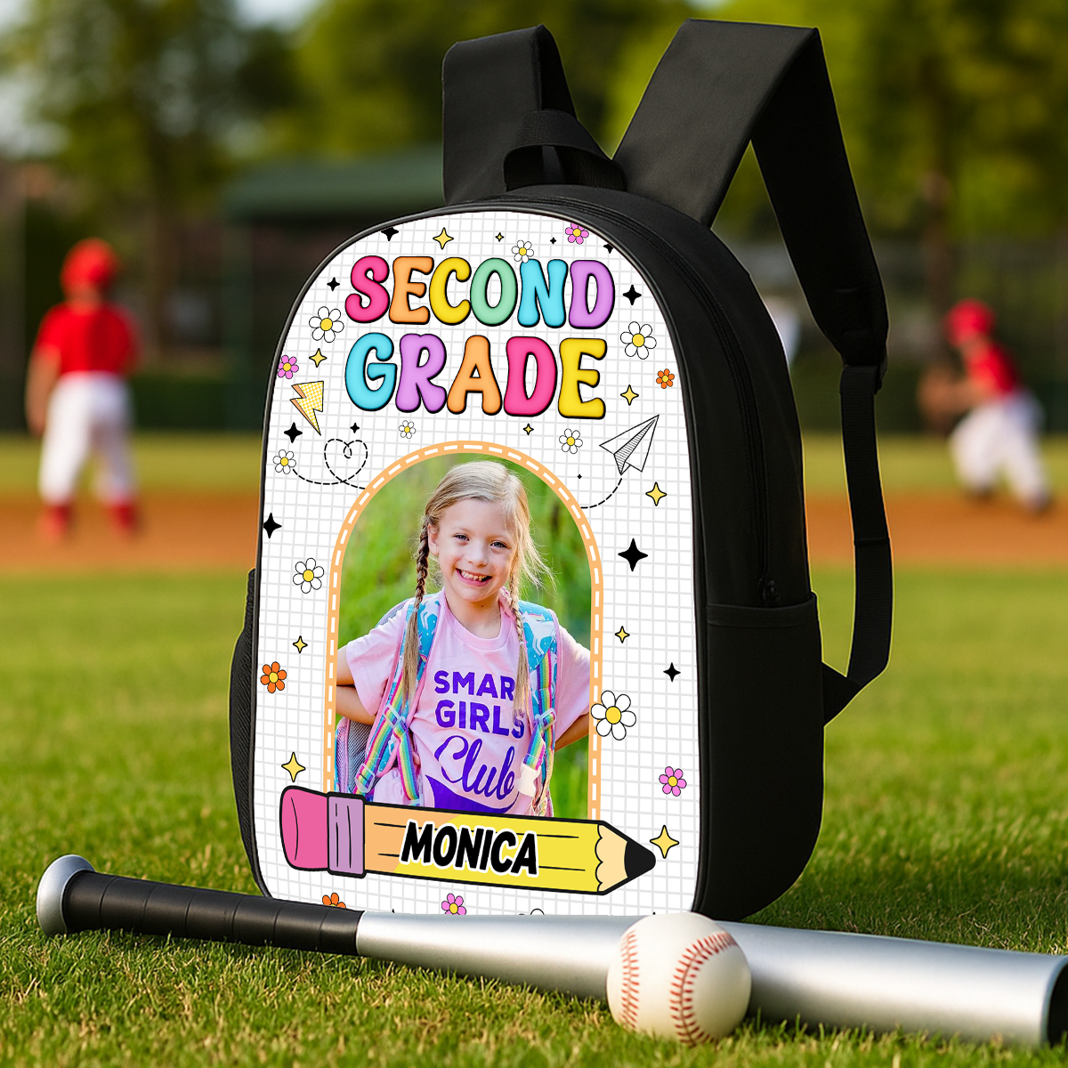 Personalized kids backpack with drawing design and custom name, perfect for school.