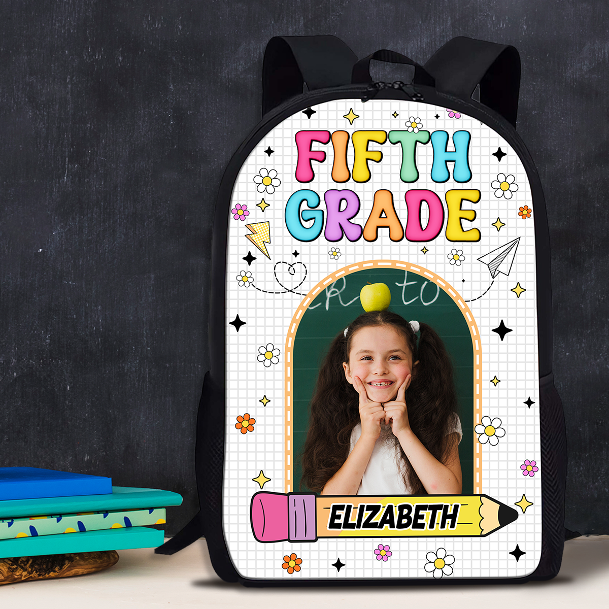 Personalized kids backpack with drawing design and custom name, perfect for school.