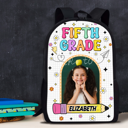 Personalized kids backpack with drawing design and custom name, perfect for school.