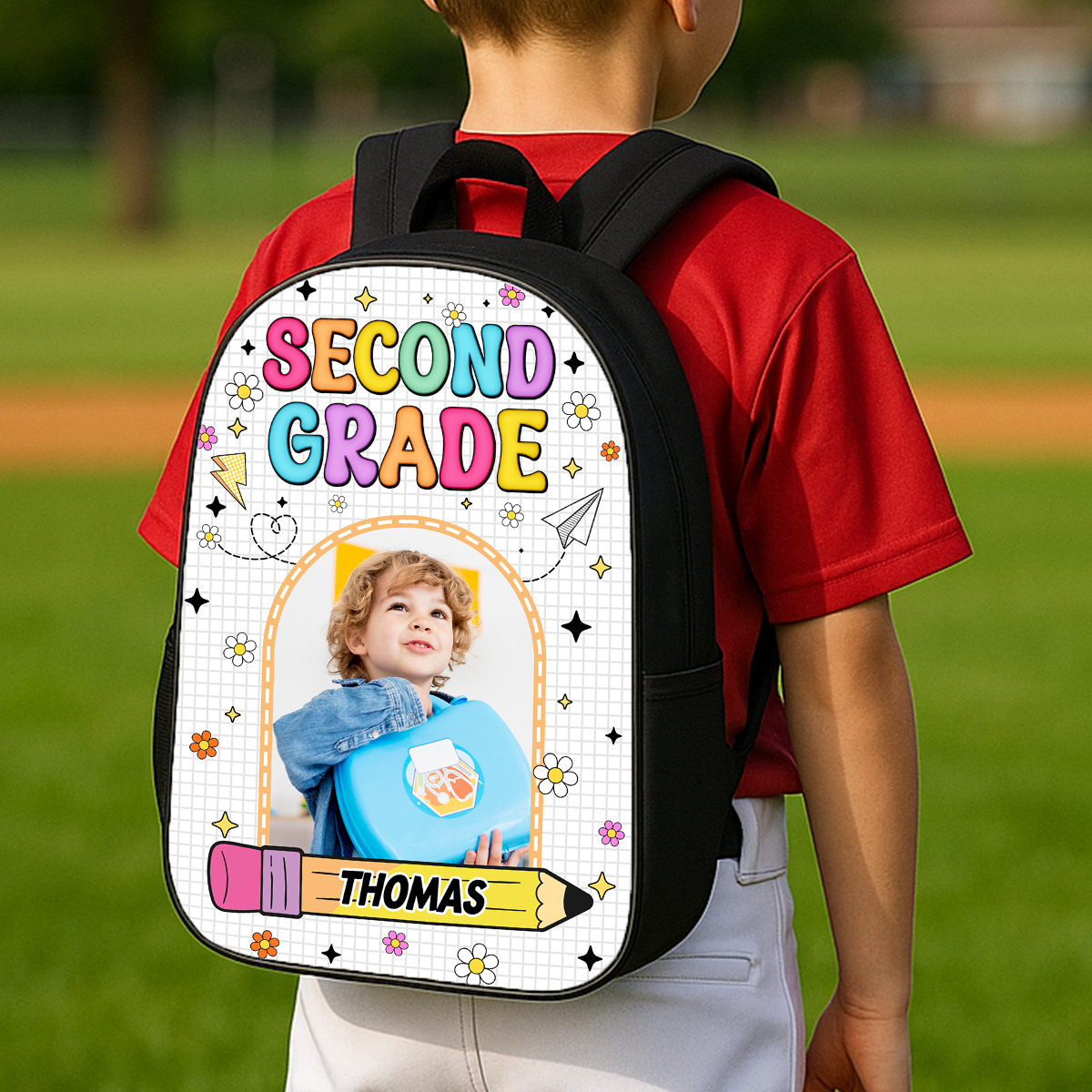 Personalized kids backpack with drawing design and custom name, perfect for school.