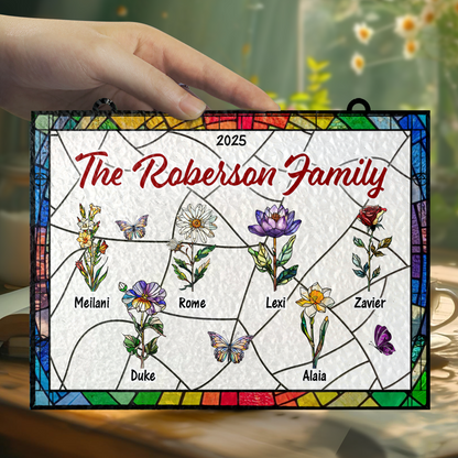 Family flowers personalized photo stained glass suncatcher hanging in a window.