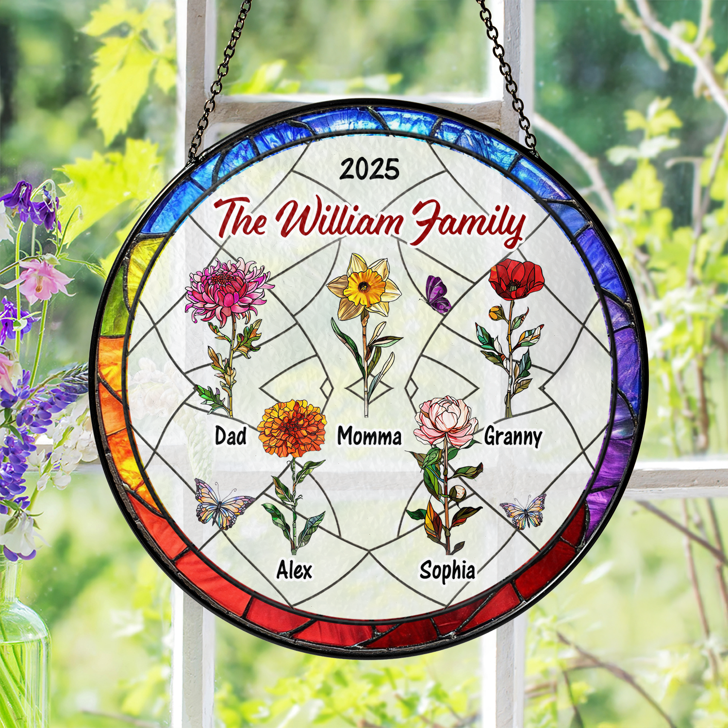 Family flowers personalized photo stained glass suncatcher hanging in a window.
