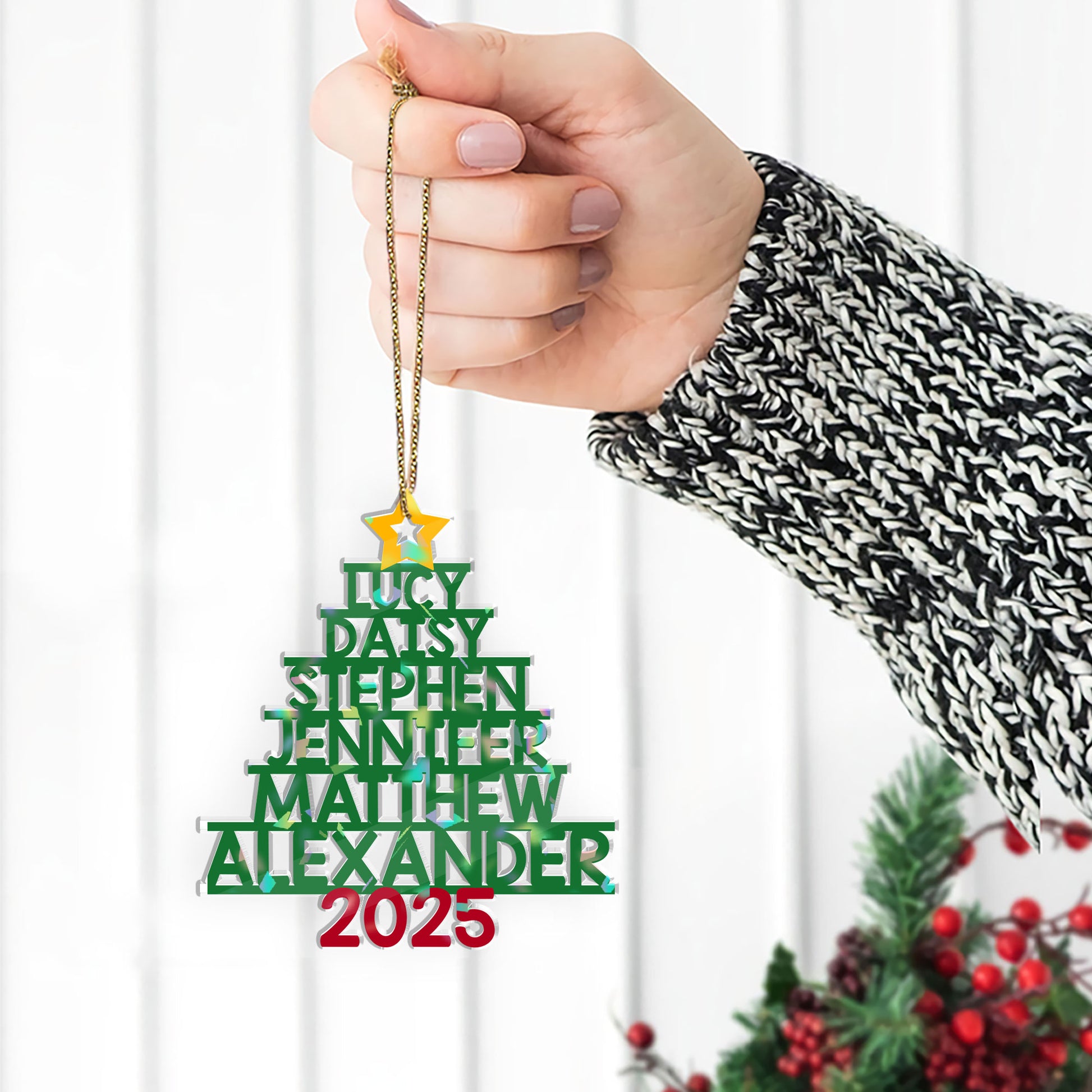 Family Names Christmas Tree Custom Shape Hologram Ornament hanging on a Christmas tree branch.