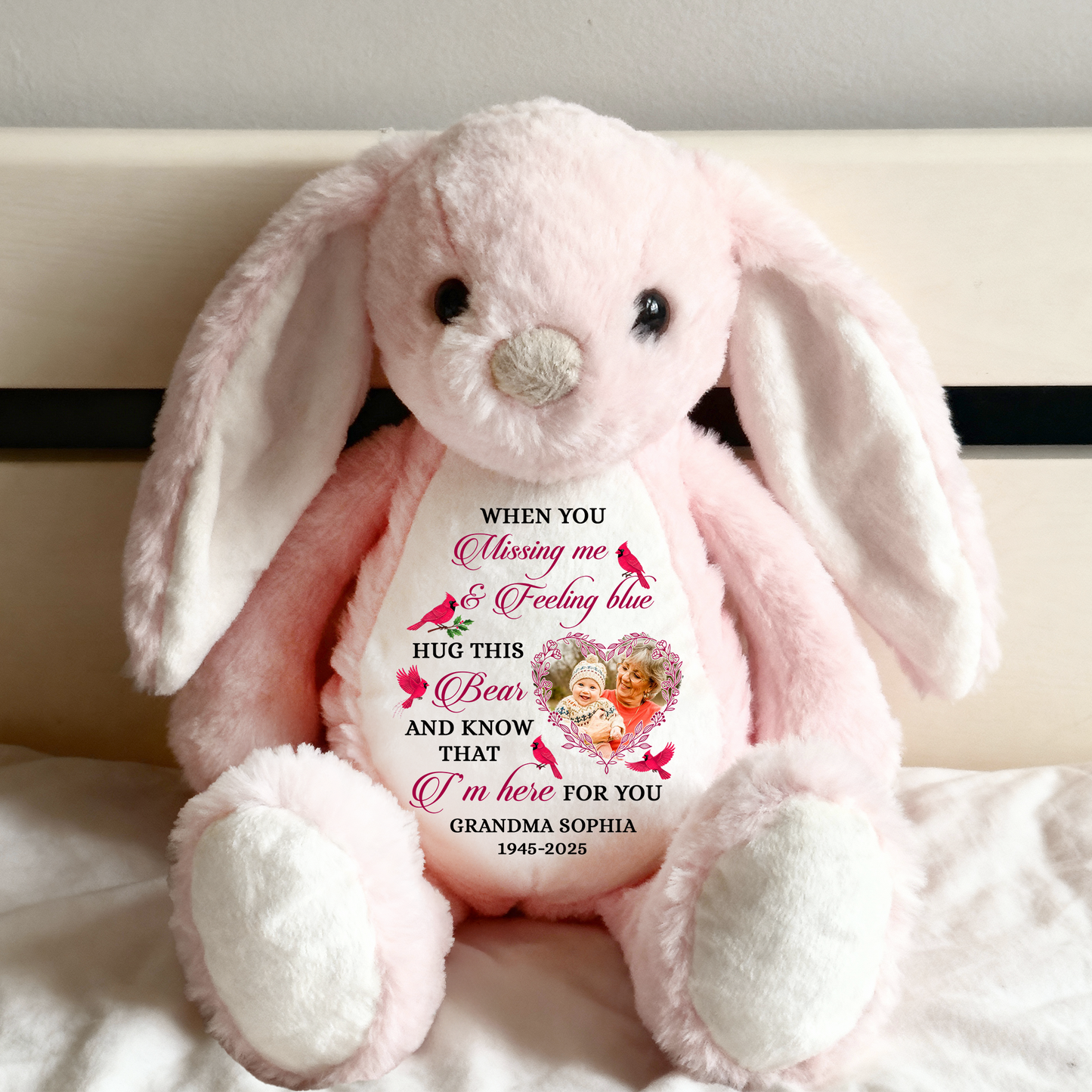 Blue memorial plush bunny rabbit with a Christmas hat and angel wings, a comforting keepsake.
