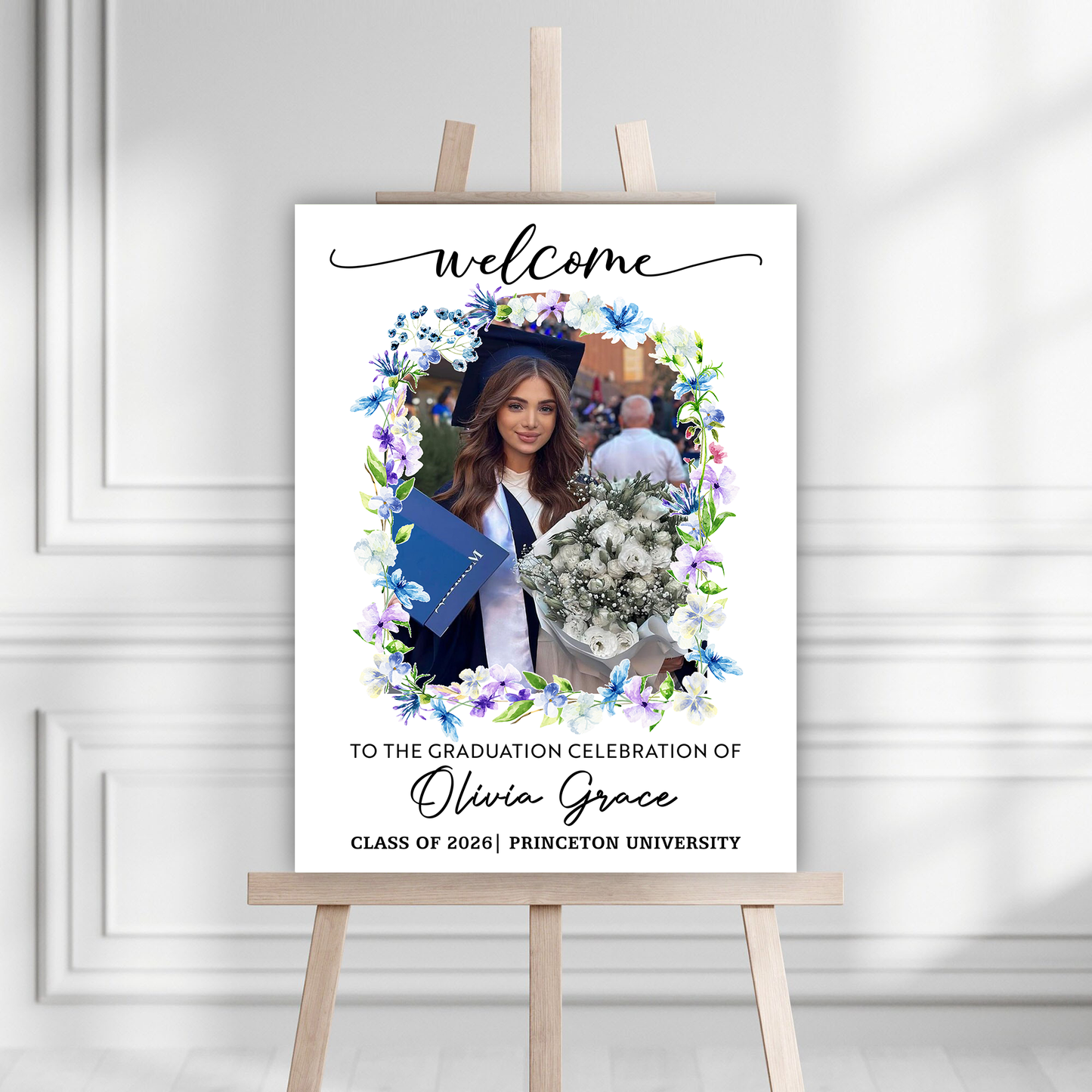 Personalized graduation welcome sign with flowers and custom photo.