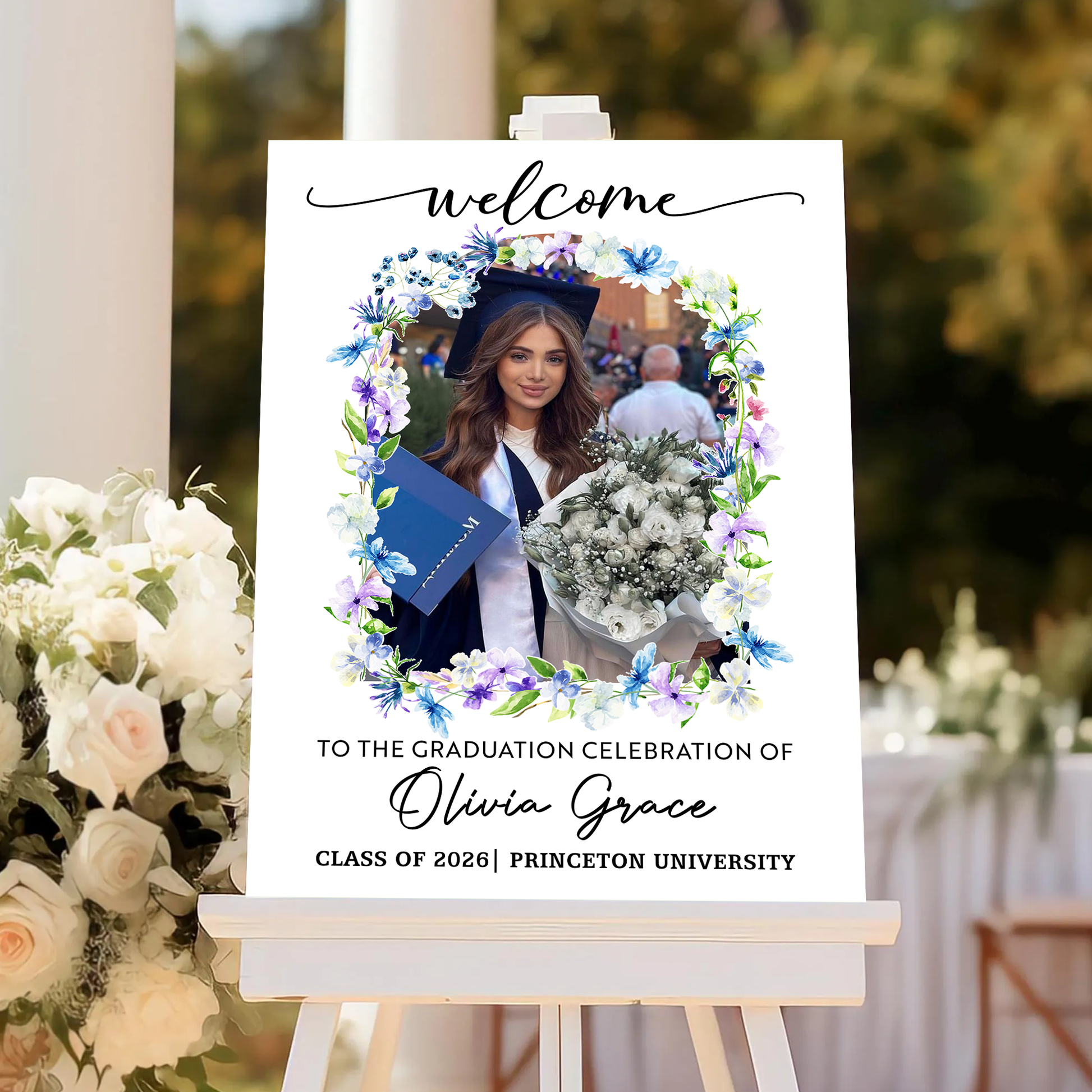 Personalized graduation welcome sign with flowers and custom photo.