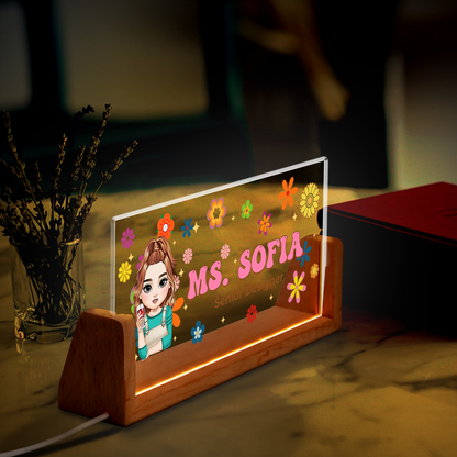 Personalized teacher desk name plate with flowers and custom name, a thoughtful teacher appreciation gift.