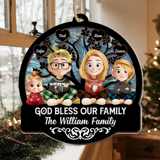 God Bless Our Family personalized Christmas suncatcher ornament hanging in a window.