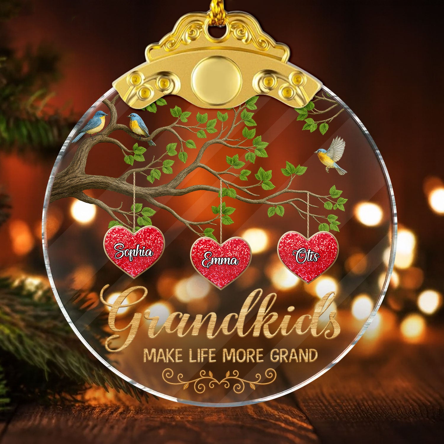Personalized "Grandkids Make Life Grand" glass ornament with a silver and gold cap, showcasing family love.