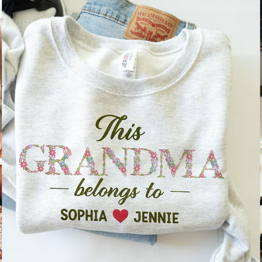 Grandma Belongs To floral embroidered crewneck sweatshirt.