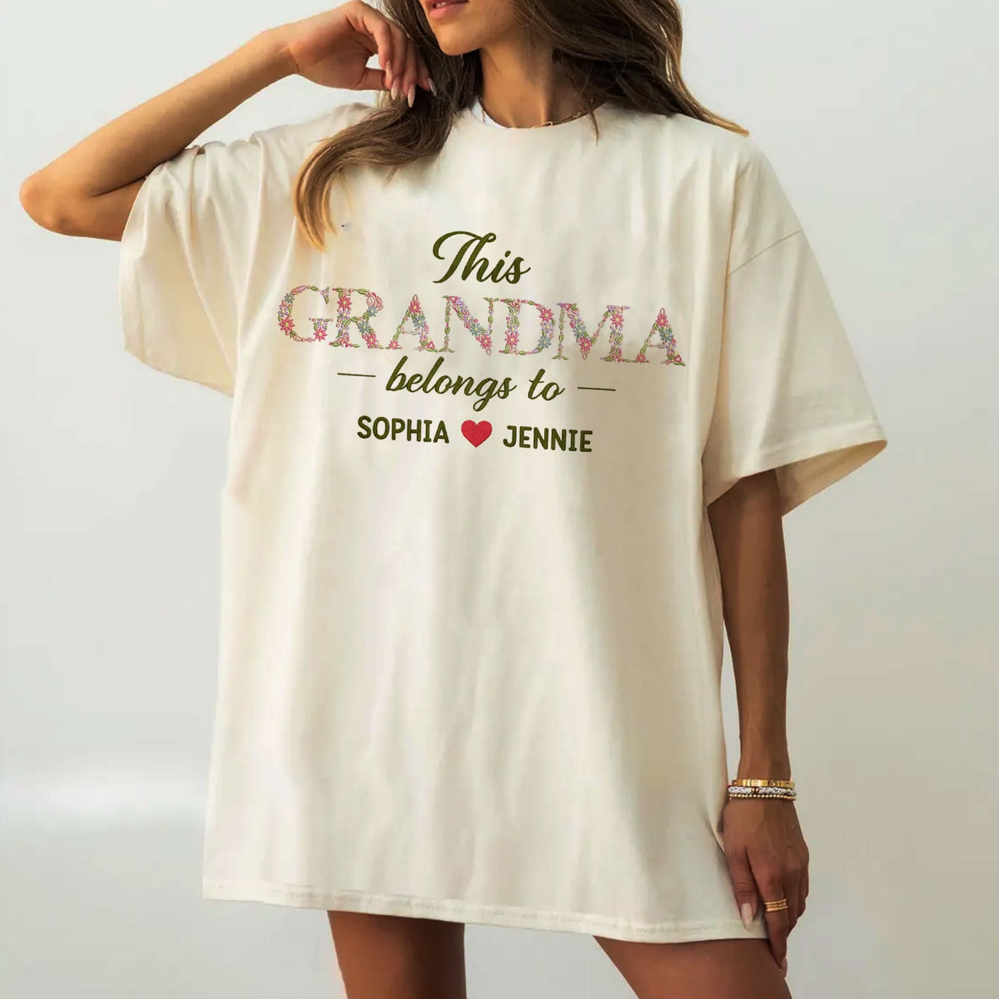 Grandma Belongs To floral embroidered crewneck sweatshirt.