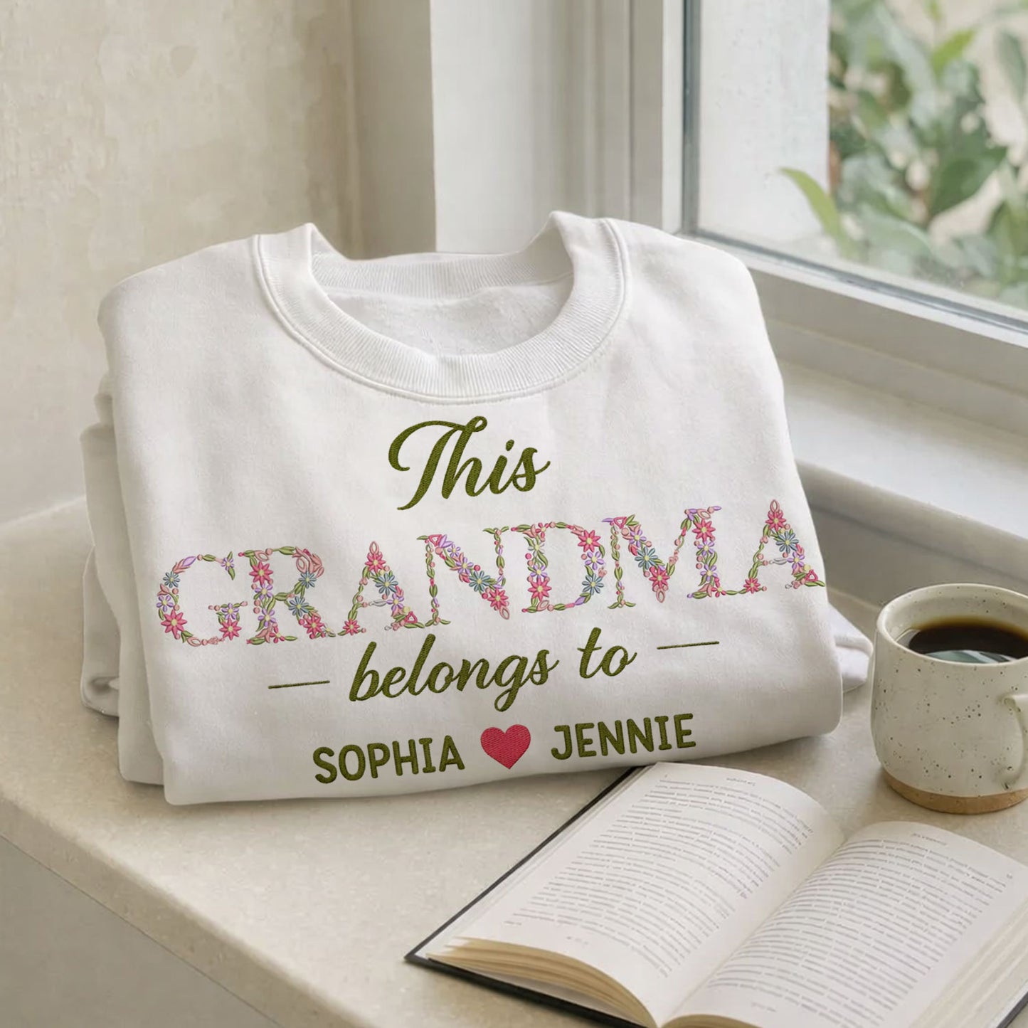 Grandma Belongs To floral embroidered crewneck sweatshirt.
