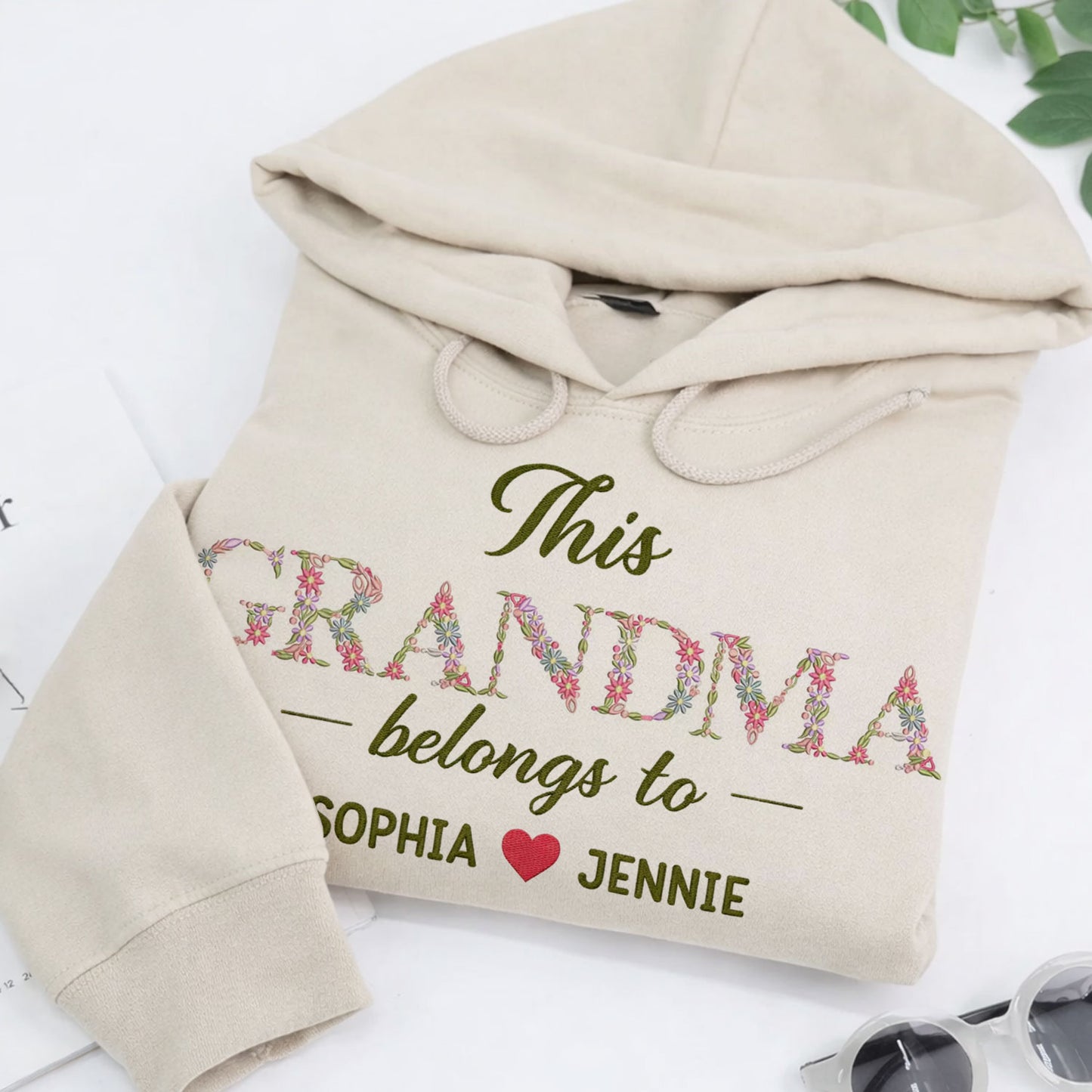 Grandma Belongs To floral embroidered crewneck sweatshirt.