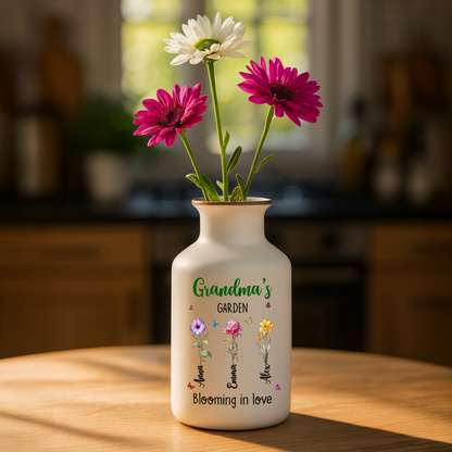 Elegant white ceramic flower vase with "Grandma's Garden is Grown with Seeds of Love" design.
