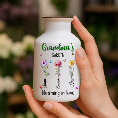 Elegant white ceramic flower vase with "Grandma's Garden is Grown with Seeds of Love" design.