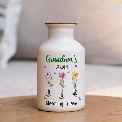 Elegant white ceramic flower vase with "Grandma's Garden is Grown with Seeds of Love" design.