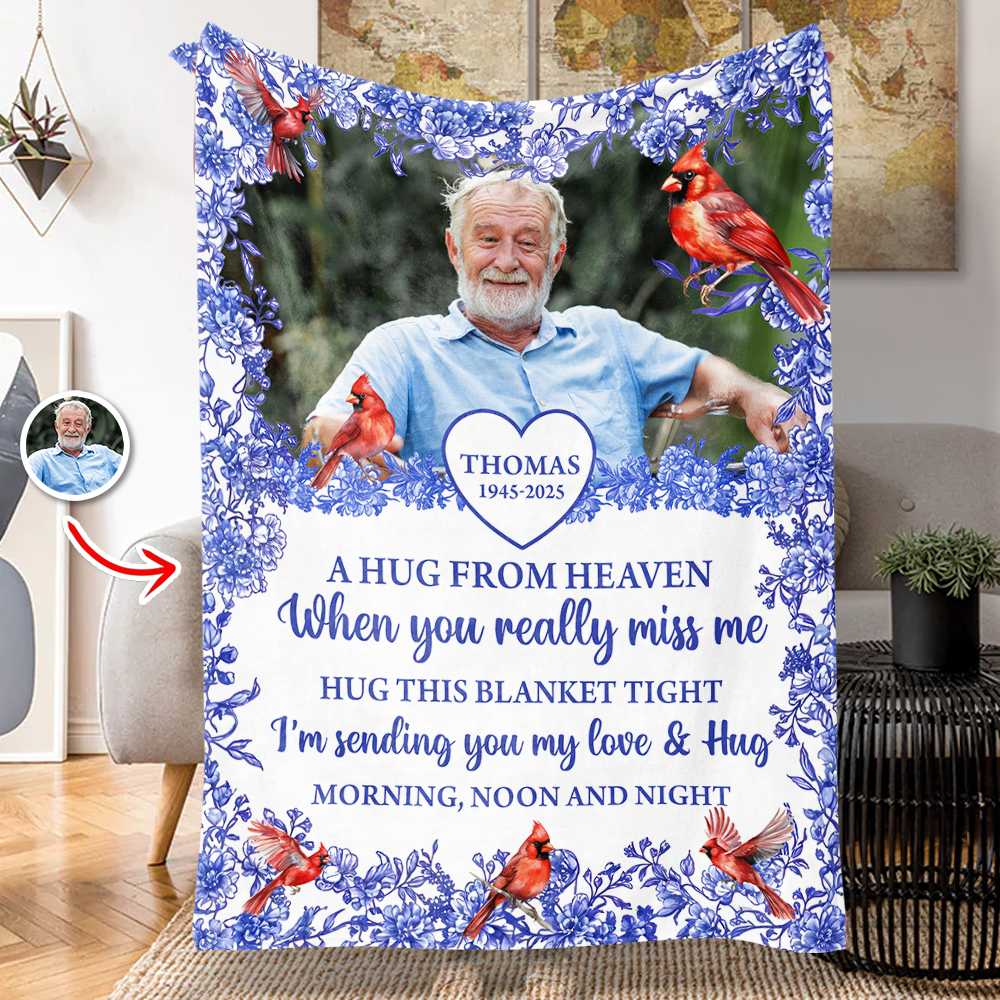 Hugs From Heaven memorial blanket with blooming flowers. A personalized sympathy gift.