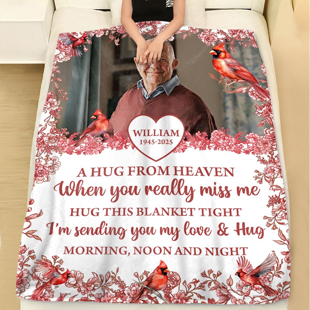 Hugs From Heaven memorial blanket with blooming flowers. A personalized sympathy gift.