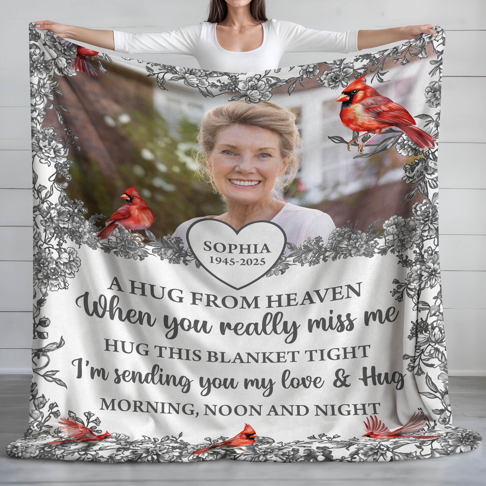 Hugs From Heaven memorial blanket with blooming flowers. A personalized sympathy gift.