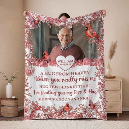 Hugs From Heaven memorial blanket with blooming flowers. A personalized sympathy gift.