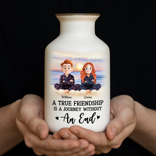 Personalized white ceramic flower vase with "It Takes a Long Time to Grow an Old Friend" inscription.